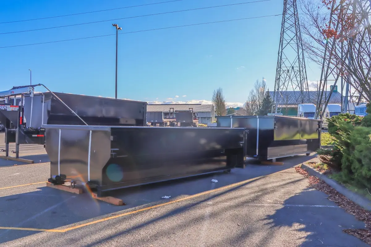 Roll-off dumpster ready for waste disposal at job site for Concrete Dumpster Rental in Hereford